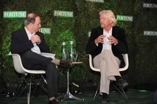 Sir Richard Branson (right) dialoguing with Andy Serwer (Managing Editor, Fortune; left).